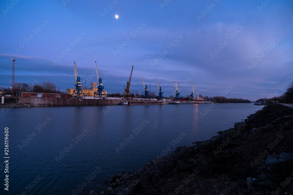 Cranes in the harbor at night