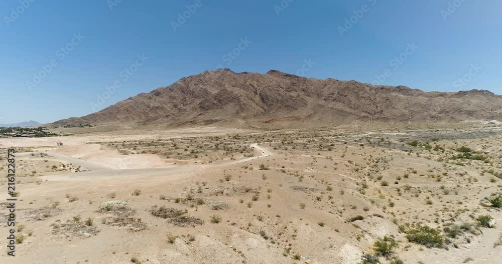 Flying in Desert Towards Sunrise Mountain Outside Vegas Flying in Desert Towards Sunrise Mountain Outside Vegas