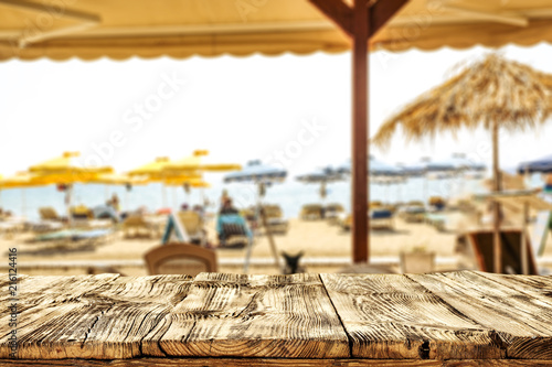 desk of free space and summer bar on beach. 