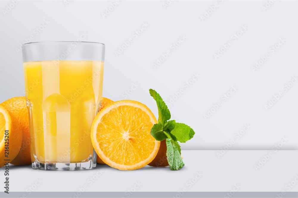 Orange juice and slices of orange Orange juice and slices of orange