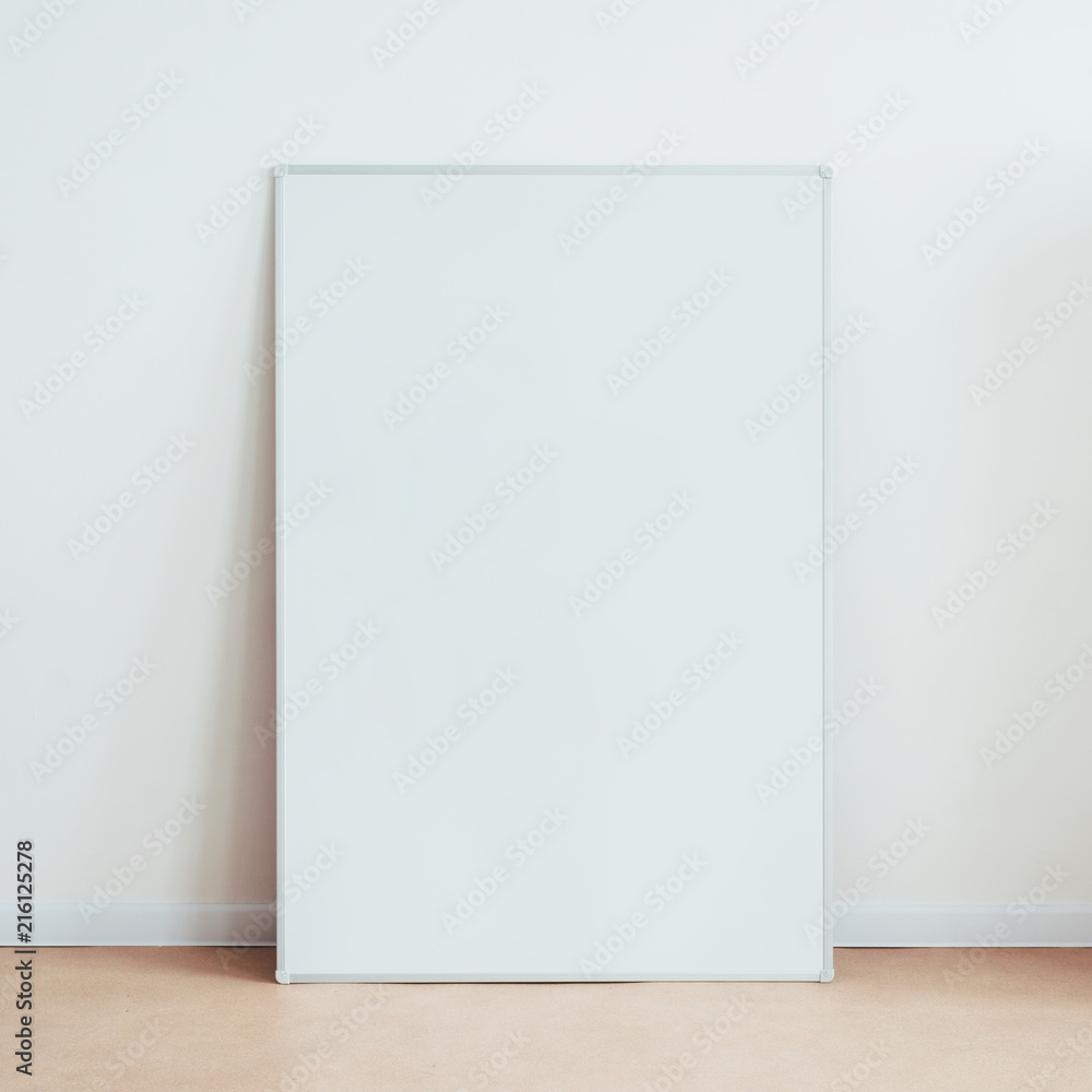 Blank white board on floor. Classroom or office business presentation Blank white board on floor. Classroom or office business presentation