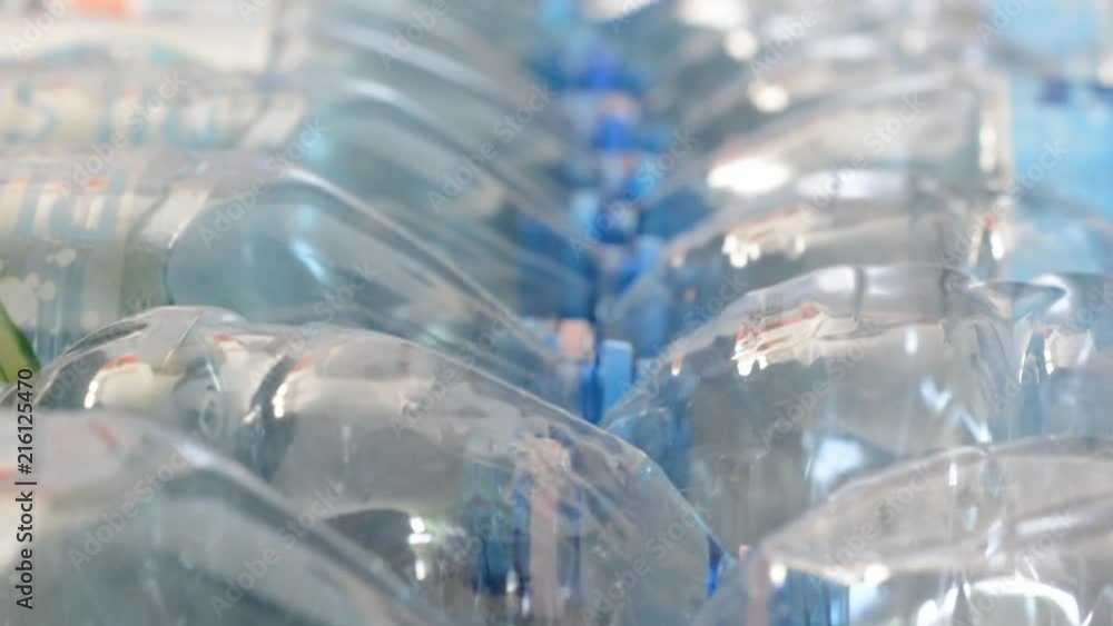 Empty plastic bottles lying on the floor Empty plastic bottles lying on the floor
