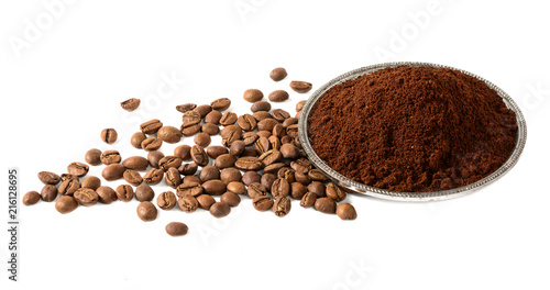 Pile of Ground coffee and coffee beans on white background