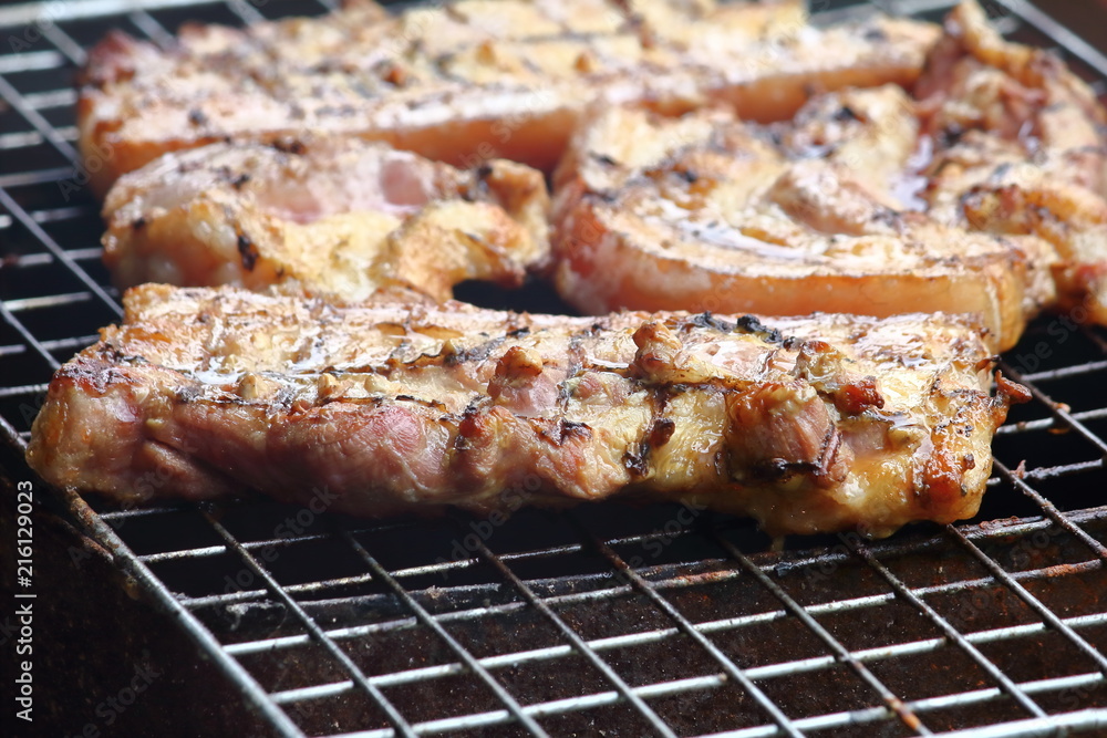 delicious food pork grilling on hot charcoal