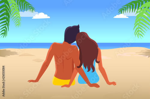 Couple Sits on Beach and Looks at Blue Deep Ocean