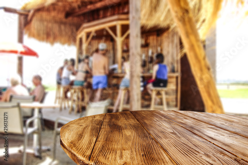 Summer photo of beach bar and desk of free space for your decoration. 