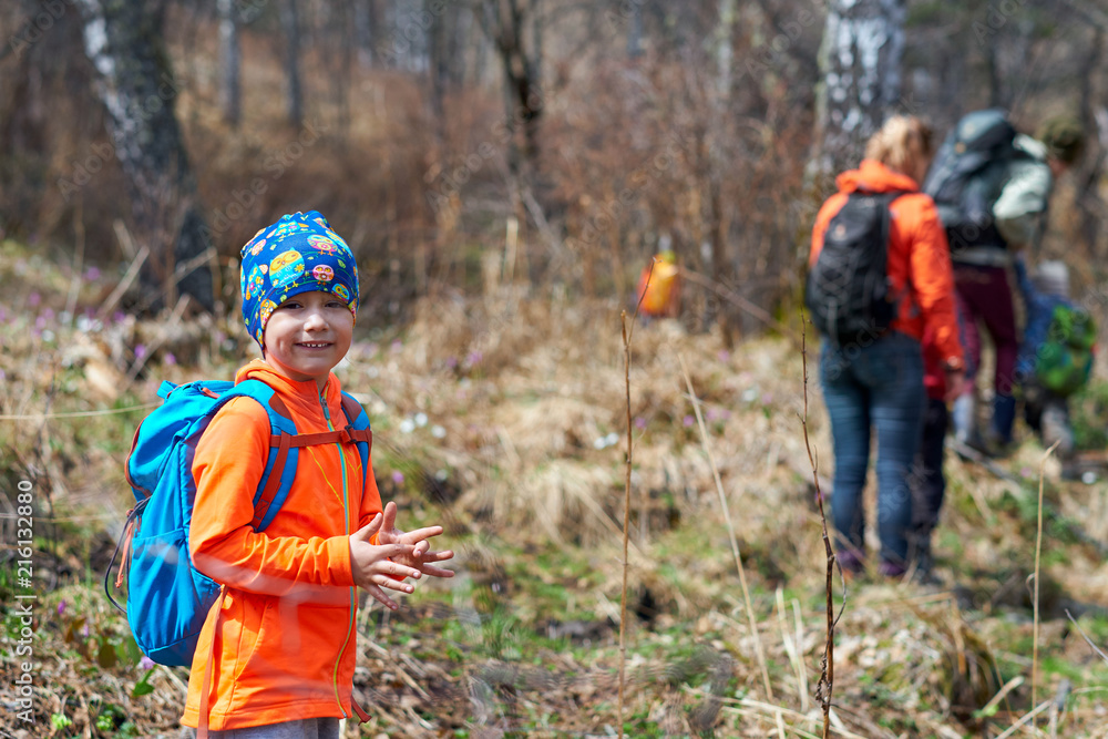 Hiking children with backpacks Hiking children with backpacks