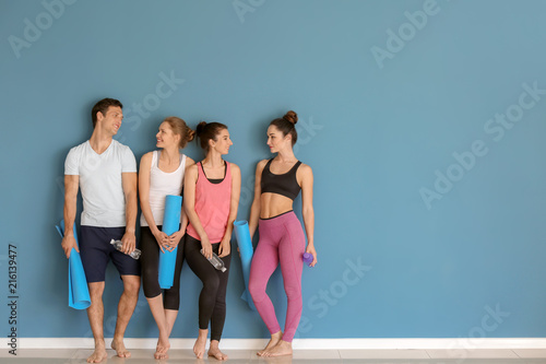 Group of people with yoga m...