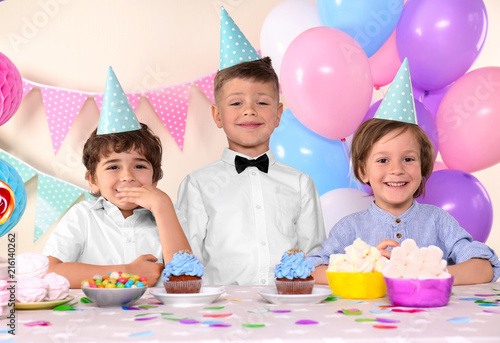 Cute little boys celebratin...