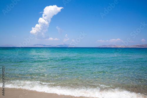 Fototapeta Naklejka Na Ścianę i Meble -  Kos, Marmari beach, Greece. Beautiful aegean sea and white sand. Transparent azur emerald turqouise water of mediterranean sea, dodecanese (dhodhekanisos).