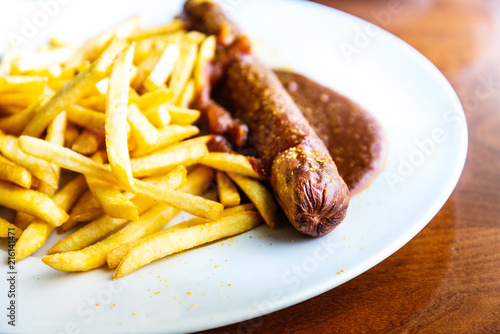 Grilled sausage served with french fries