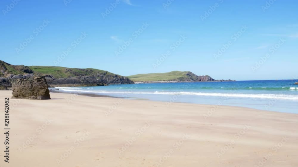 Deserted and rocky and clean beach near cliffs at Sango Sands, Durness, Scotland. Deserted and rocky and clean beach near cliffs at Sango Sands, Durness, Scotland.