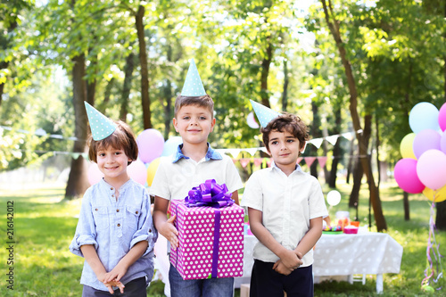 Cute little boy with gift b...