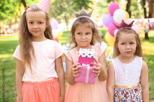 Cute little girl with gift ...