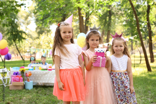Cute little girl with gift ...