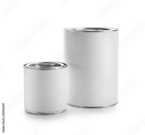 Cans of paint on white background