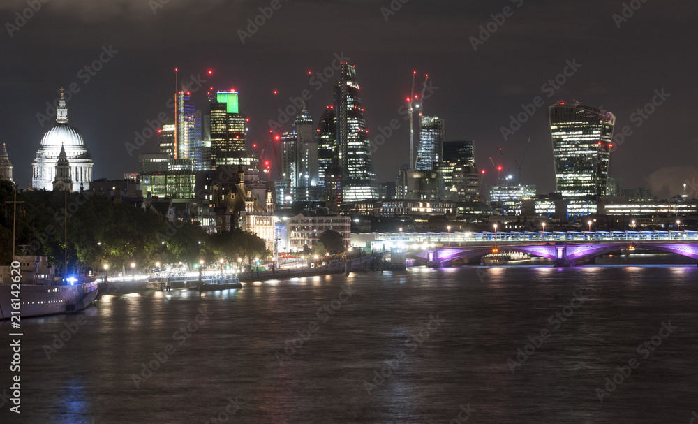 London skyline at night from Waterloo Bridge
