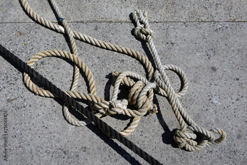 Old Ship rope knot on pier background