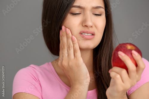 Young woman with sensitive ...