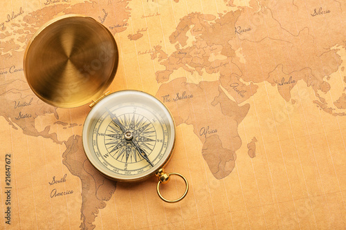 Golden compass on vintage w...