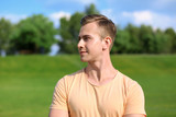 Young man in park on sunny day