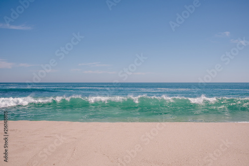 Waves breaking on beach, Australia