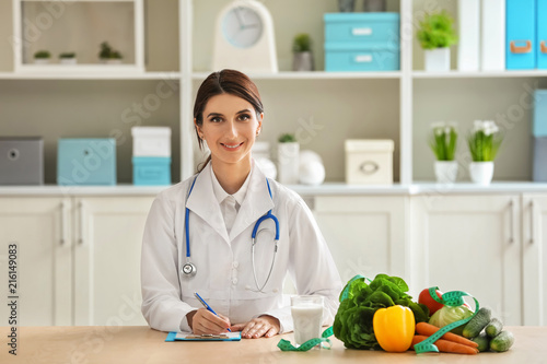 Female nutritionist sitting...
