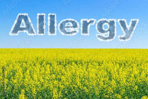 Pollen allergy: Types, Symptoms and Treatment. Text allergy from clouds on blue sky and field of yellow flowers photo