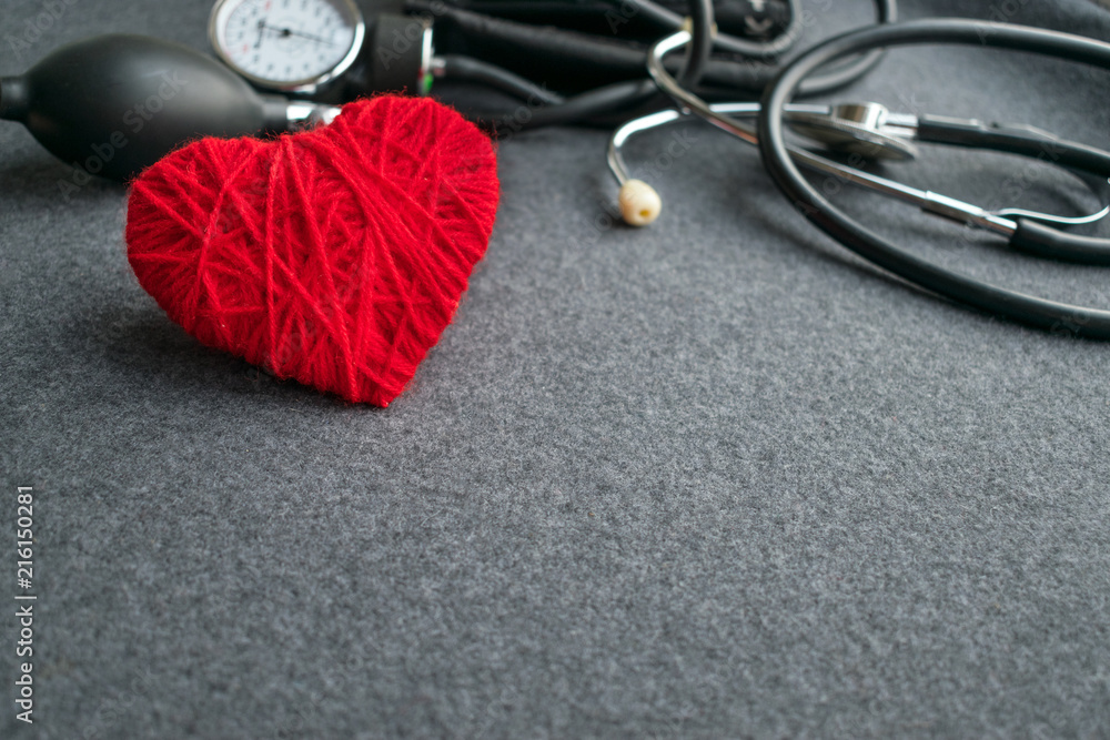 Medical mockup flat lay. White notebook, Red thread heart with ...