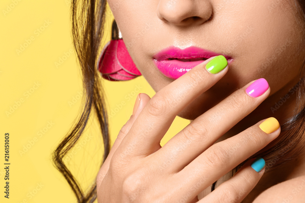 Beautiful young woman with professional manicure on color background, closeup - obrazy, fototapety, plakaty 