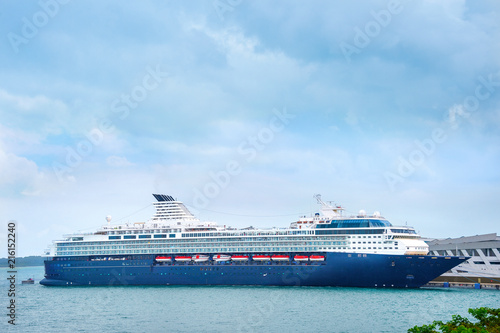 Cruise liner under rainy sky