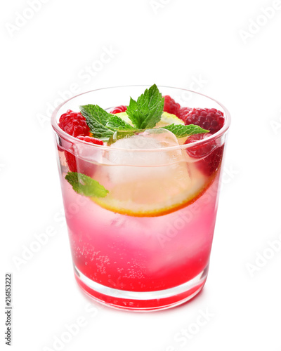 Glass of fresh raspberry mojito on white background