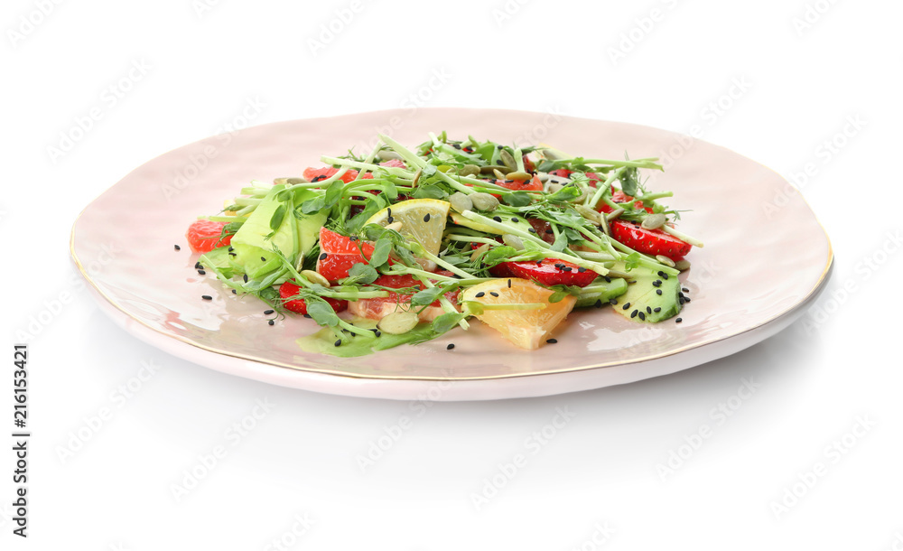 Plate with delicious fresh salad on white background Plate with delicious fresh salad on white background