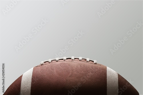 American football ball on background