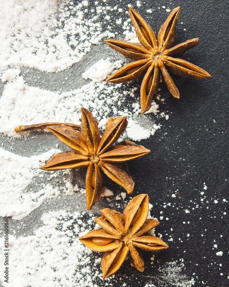 scattered with powder and cinnamon scattered with powder and cinnamon