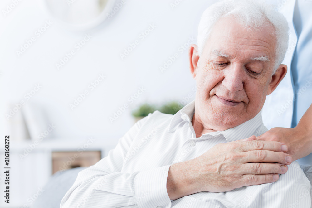 Φωτογραφία Close-up of senior man touching hand of friendly caregiver