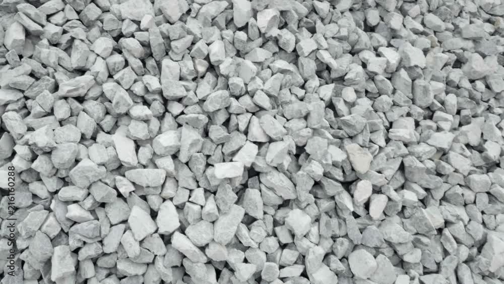 Gravel of large fractions. Crushed stone, building aggregate, stone structure. Pile of building material