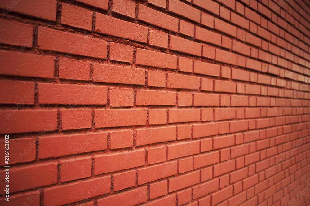 Obraz premium Crop horizontal shot of a red weathered wall that has an infinite endless view