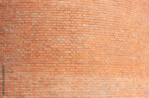 Brick Wall Pattern of Orange Stone Wall Texture Background. Abstract Bright Brick Stones Pattern, Colorful Old Rough Wall Canvas Background. Brickwall Material Surface Close Up View with Copy Space.