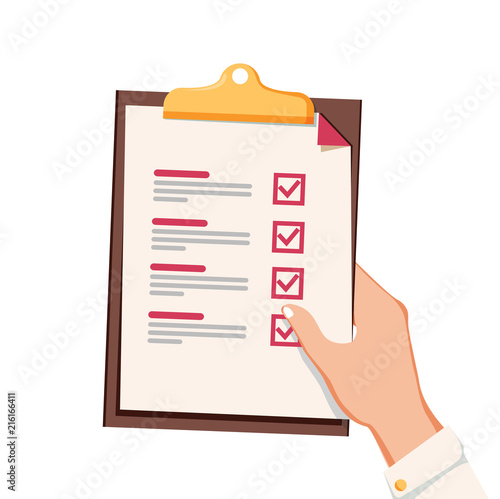 Hand with checklist. Hand holding and completing checklist on clipboard. Business concept.