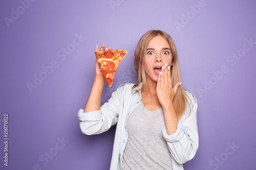 Surprised woman with slice ...