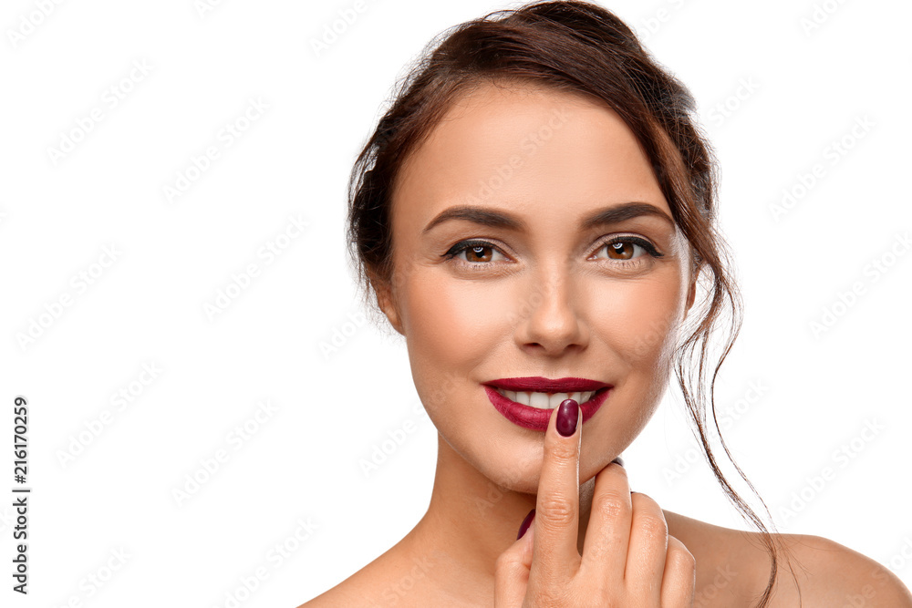 Beautiful young woman with professional manicure on light background Beautiful young woman with professional manicure on light background