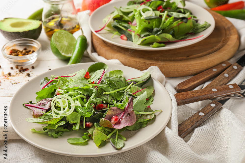 Plate with healthy vegetable salad on table Plate with healthy vegetable salad on table