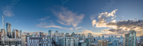 Panorama of Vancouver's Yaletown district with blue sky and clouds © lexfosse