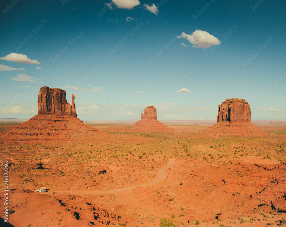 Beautiful view of blue sky and orange sand rocks, Monument Valley, Utah, USA