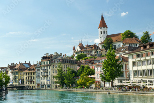 People enjoying sunny afternoon near Aare river in Thun © Michal