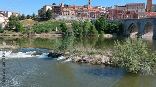 Beautiful views of the town and the river, surrounded by nature, plants, flowers and trees photo