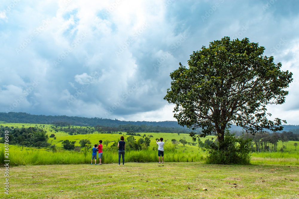 Tourists in meadow at Thung Salaeng Luang , Phetchabun in Thailand.