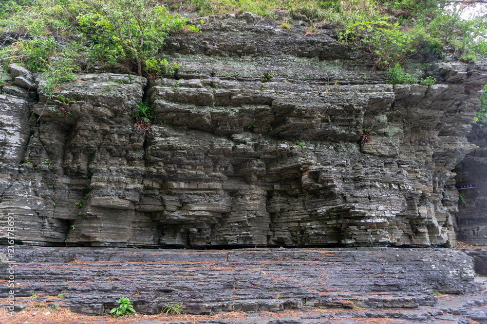 Layer of ancient rock cliff in Sangjogam Country Park in Geosong, South Korea