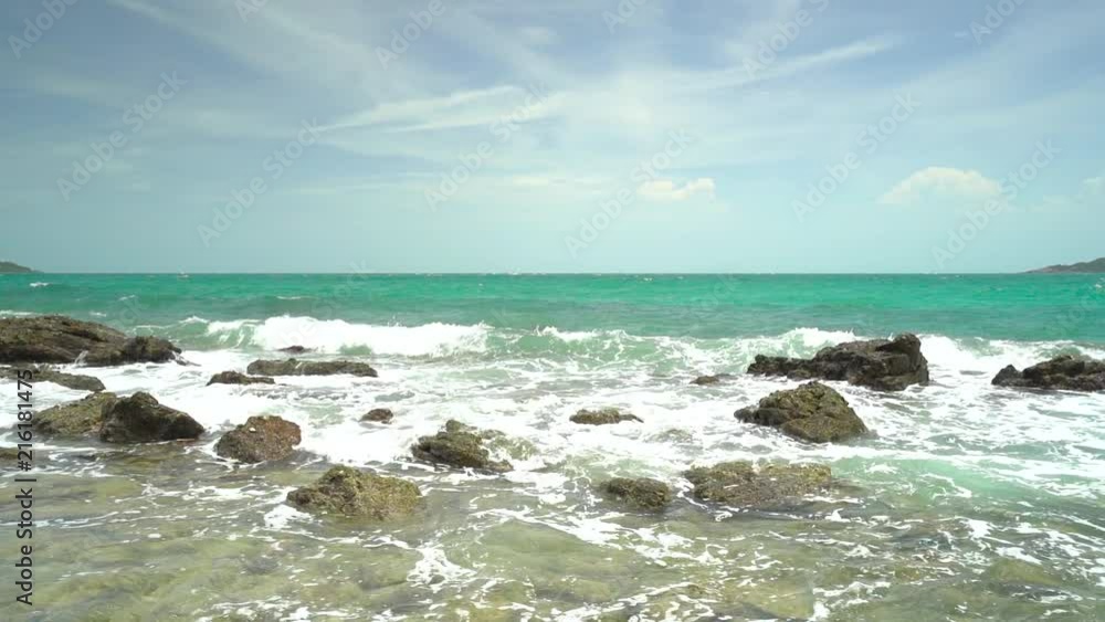 Slow Motion, Ocean wave with large wave crashing on rock Slow Motion, Ocean wave with large wave crashing on rock